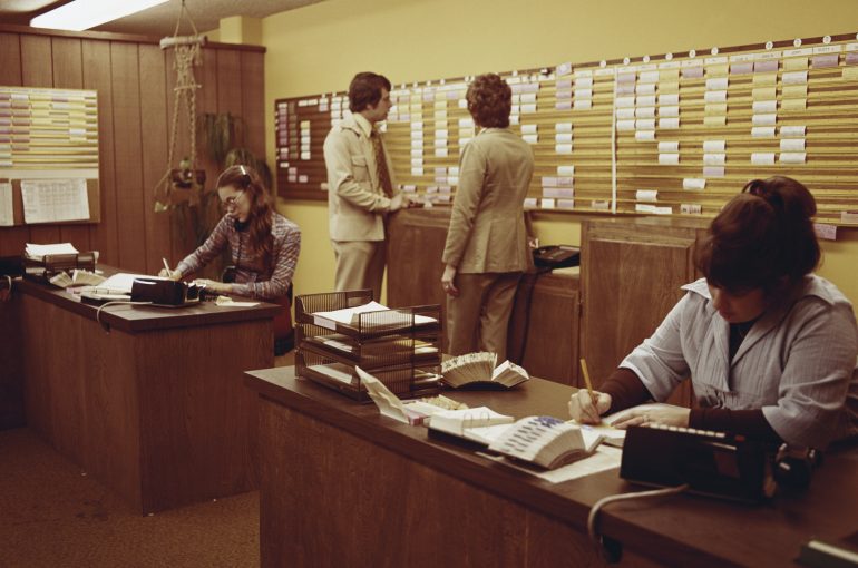 An image of an old school office, circa. 1970